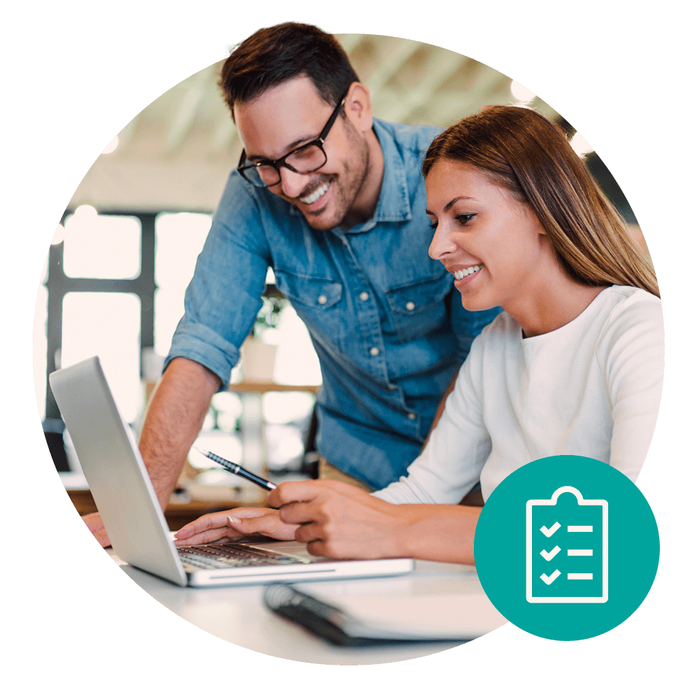 two people looking at laptop