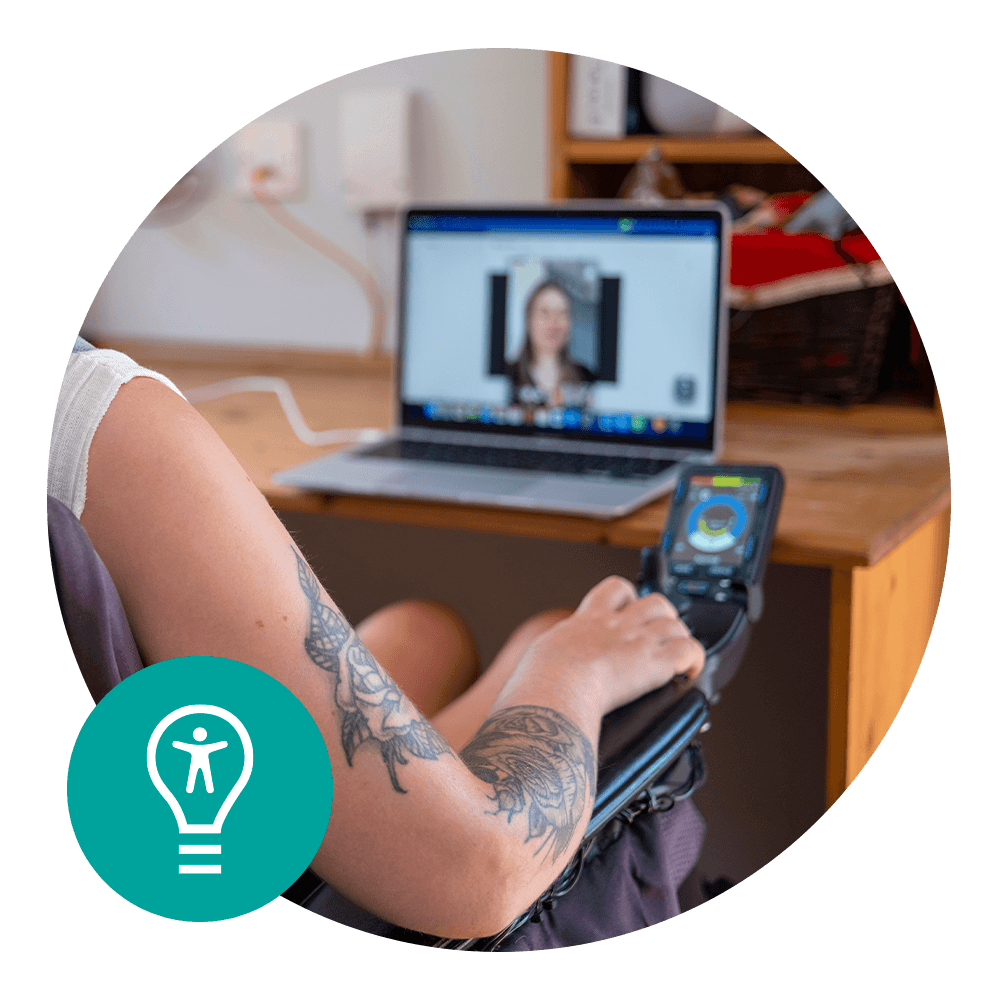 woman sitting at laptop in wheelchair