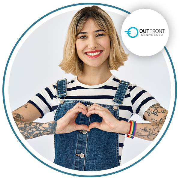 Image of a young woman with tattoos making a heart with the OutFront Minnesota logo