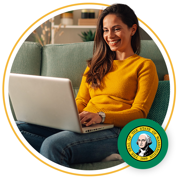 woman sitting on chair using laptop