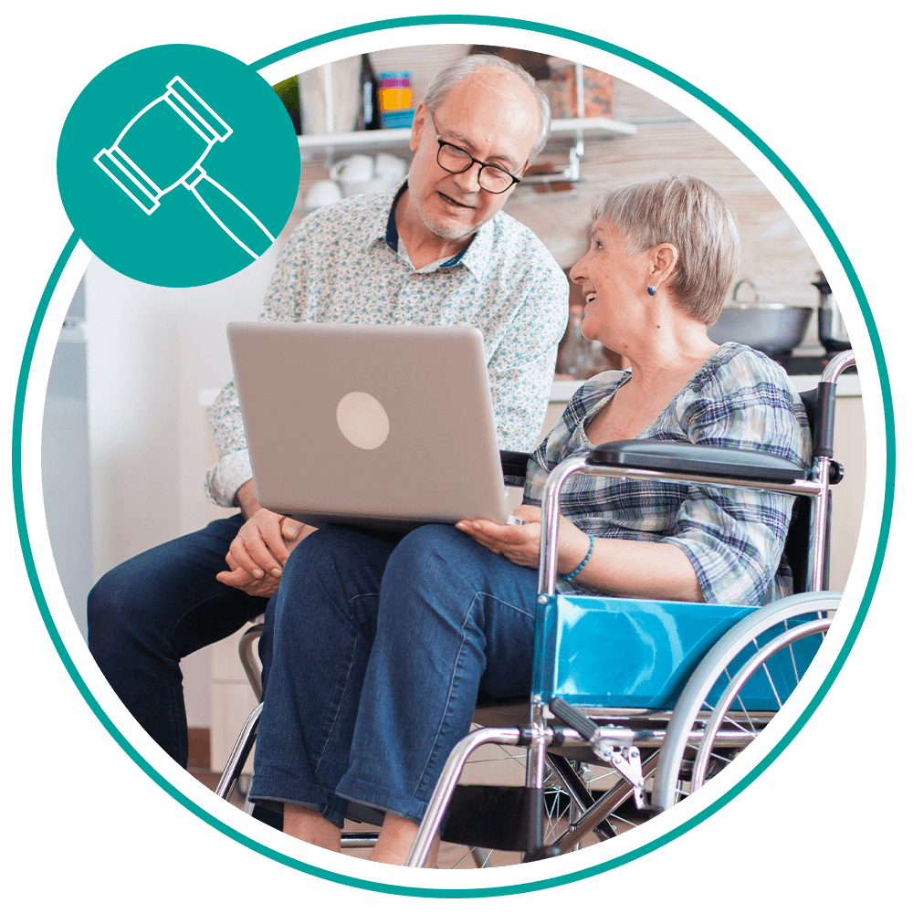 two old people sharing a laptop