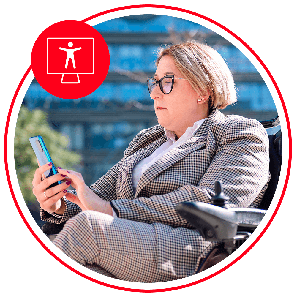 woman sitting in suit using mobile phone