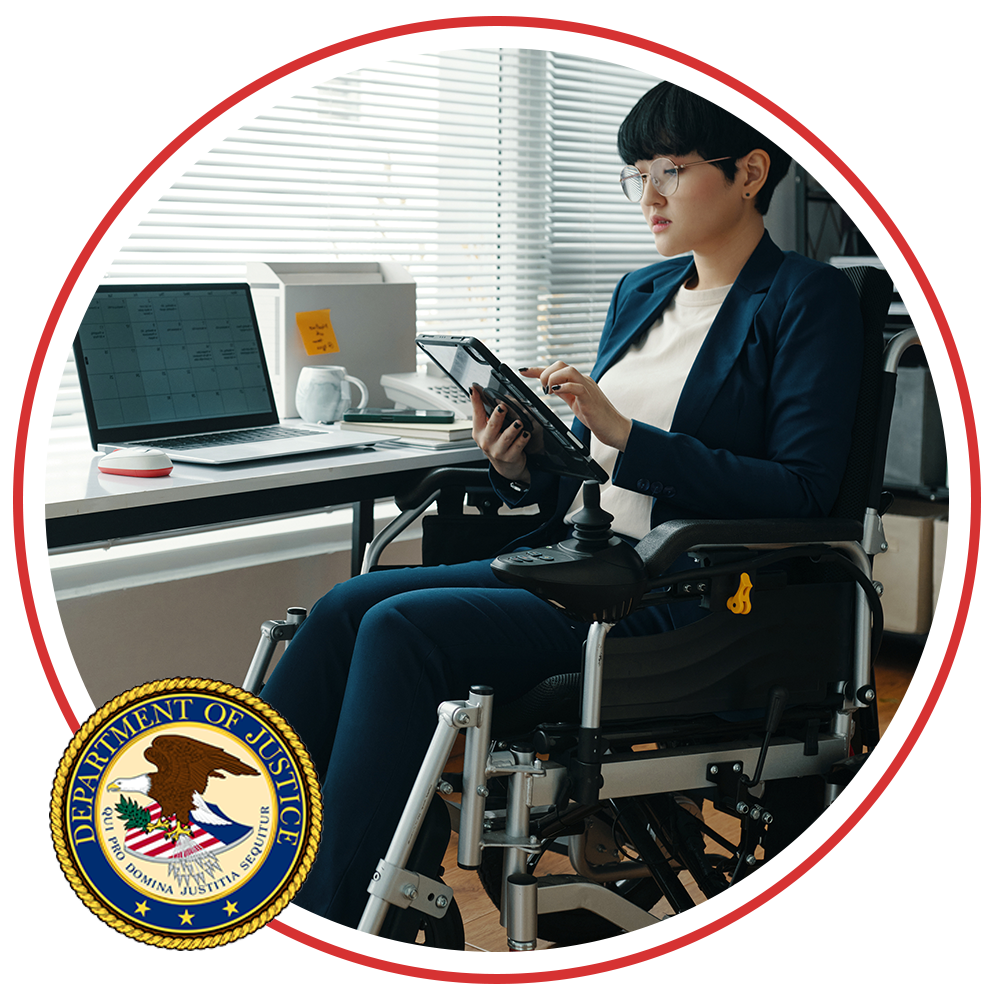 disabled person sitting in wheelchair looking at tablet