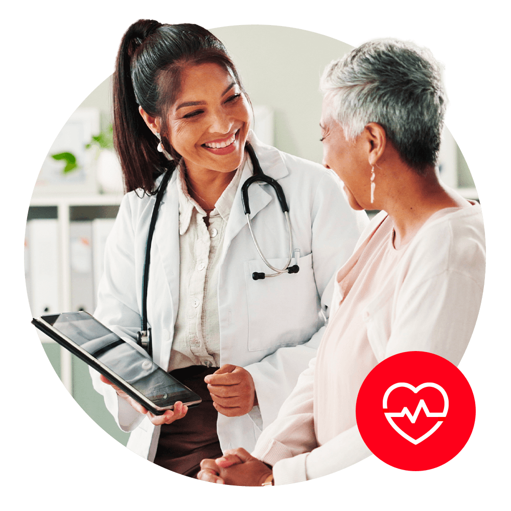 two doctors sharing an ipad and working together