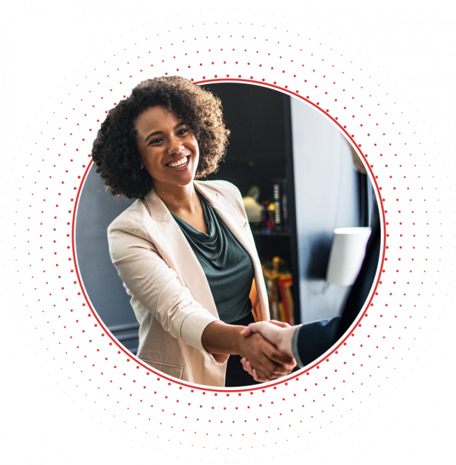 Woman shaking hands in an office
