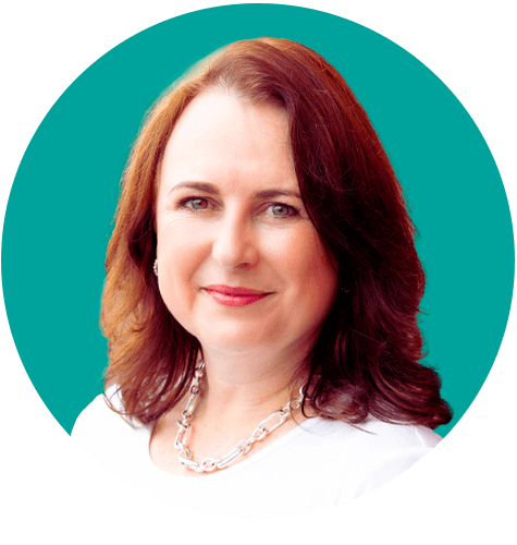 Headshot of Natasha smiling into the camera