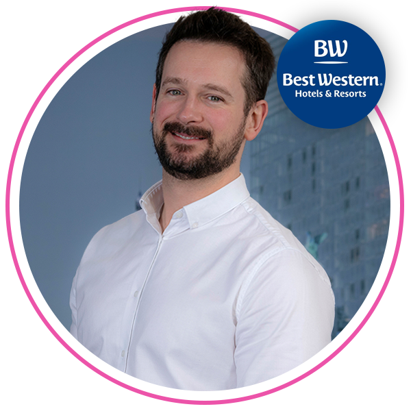 headshot of Chris Bowling smiling into the camera with the Best Western logo to his right