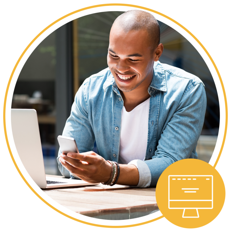 man smiling at phone