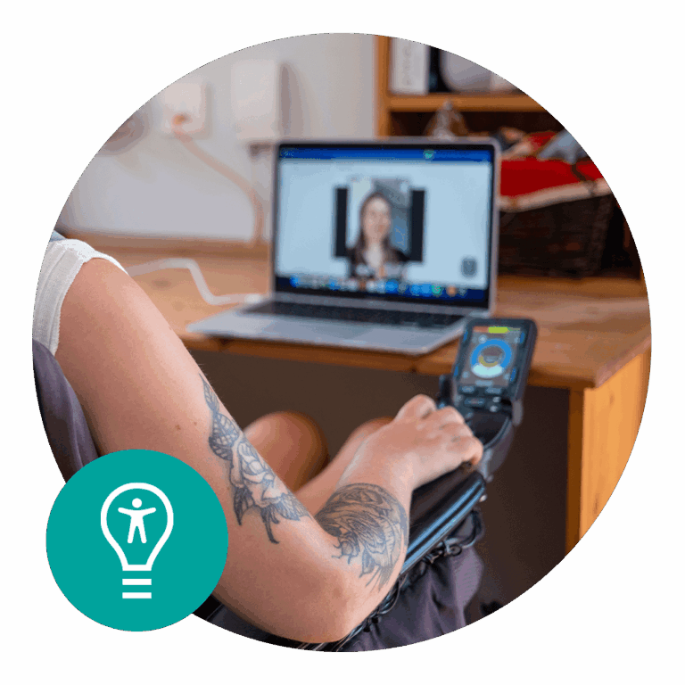 woman sitting at laptop in wheelchair