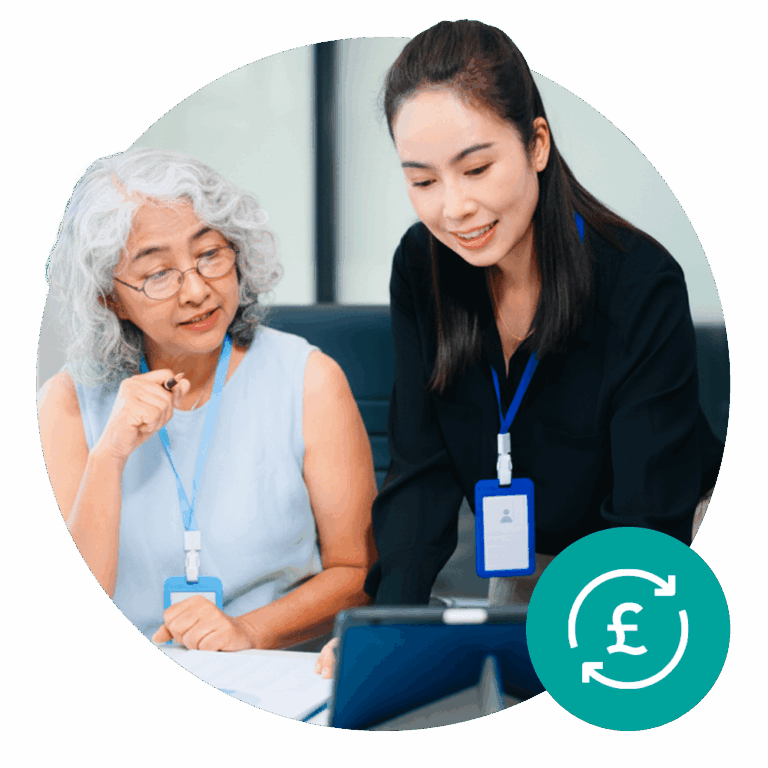 Two council employees review a document on a tablet.
