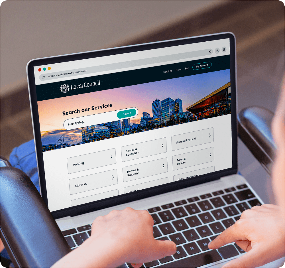 Woman in a wheelchair viewing a council website on a laptop